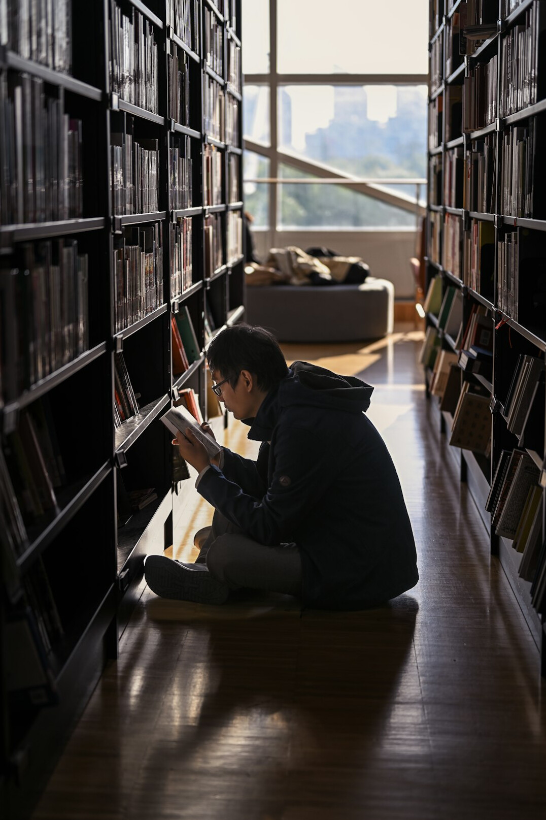 student studying in library
