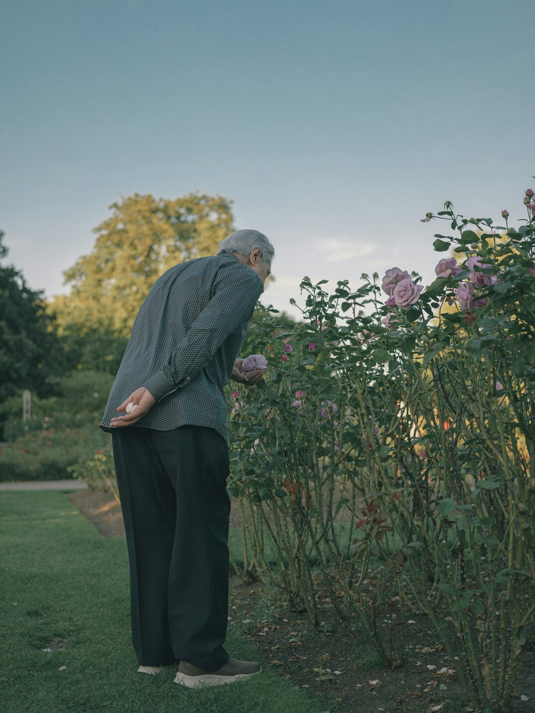 happy grandmother in garden
